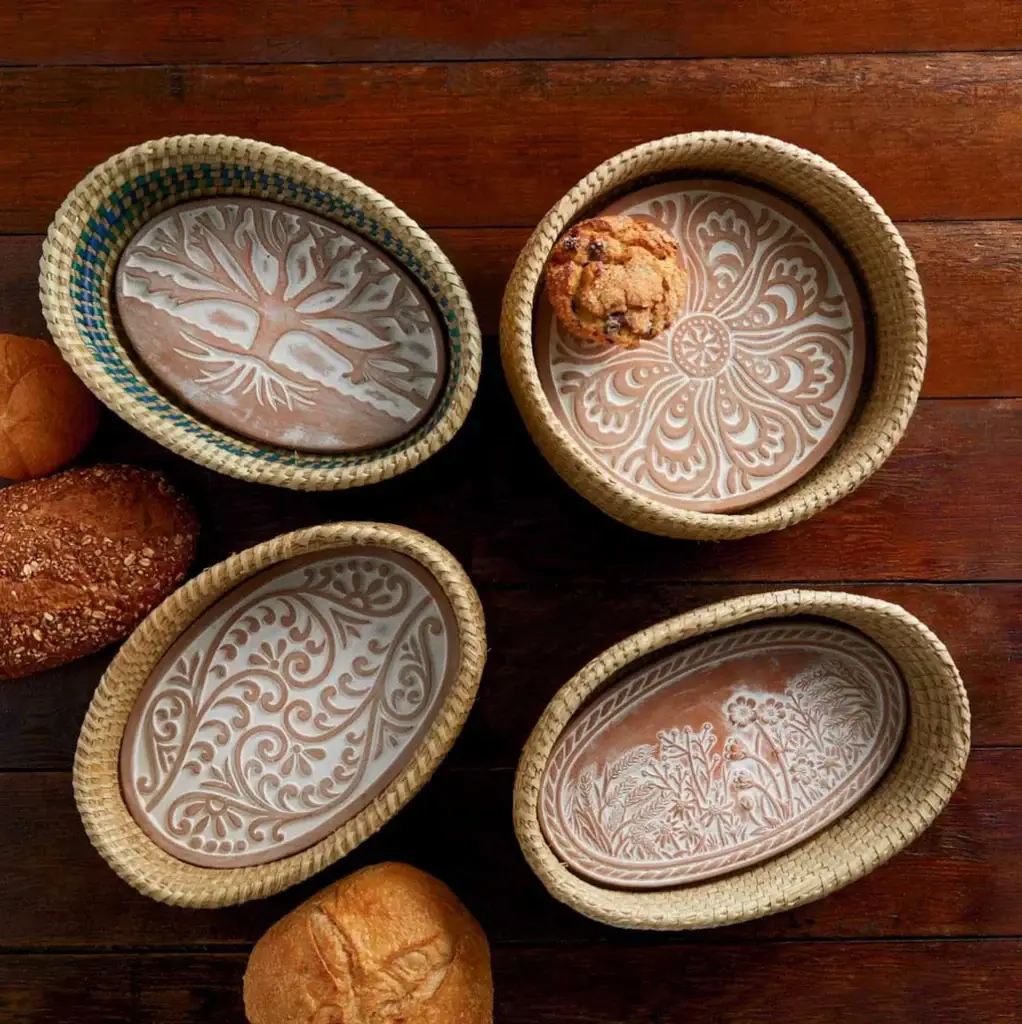 Several ceramic bread warmers