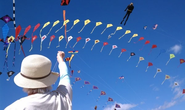 A woman flying kites at Ogunquit beach.